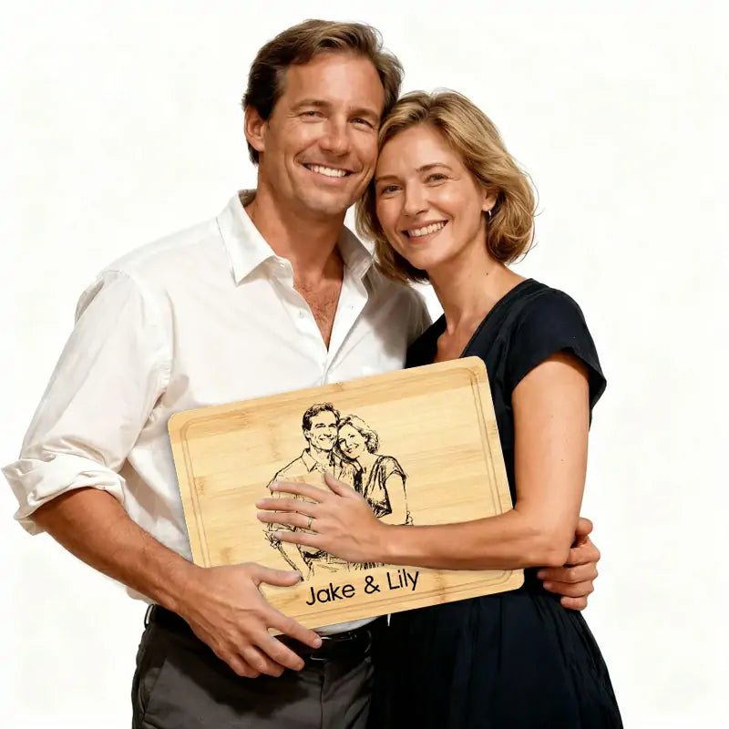 Couple holding personalized wood engraved cutting board with their engraved photo & names, custom anniversary gift | PrintToucan