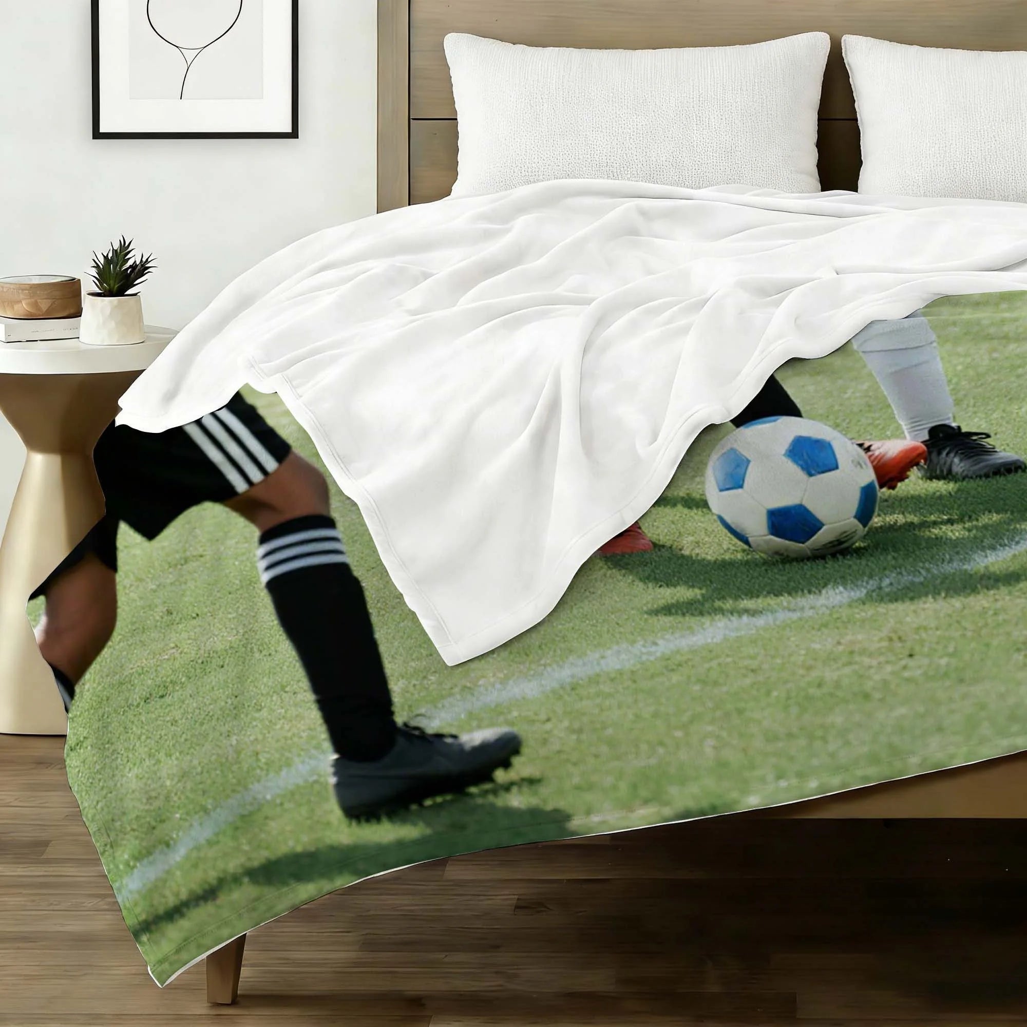 Wrap yourself in comfort with this plush fleece blanket. The vibrant soccer photo print makes it a great addition to any fan’s living space.